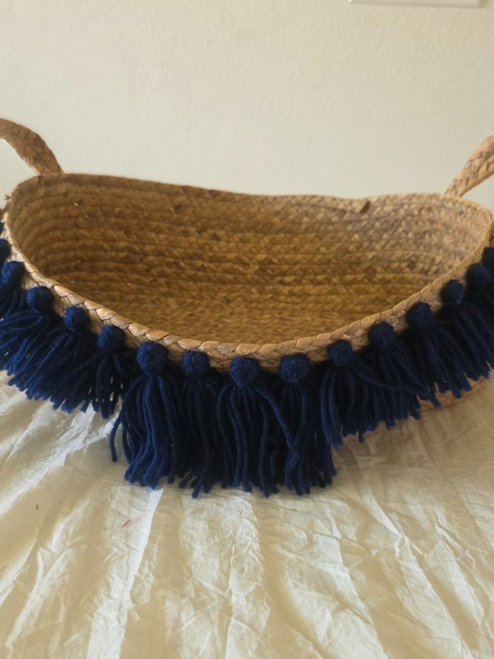 Severine Oval Basket Featuring Navy Blue Tassels Accents With Handles 16" x 12"